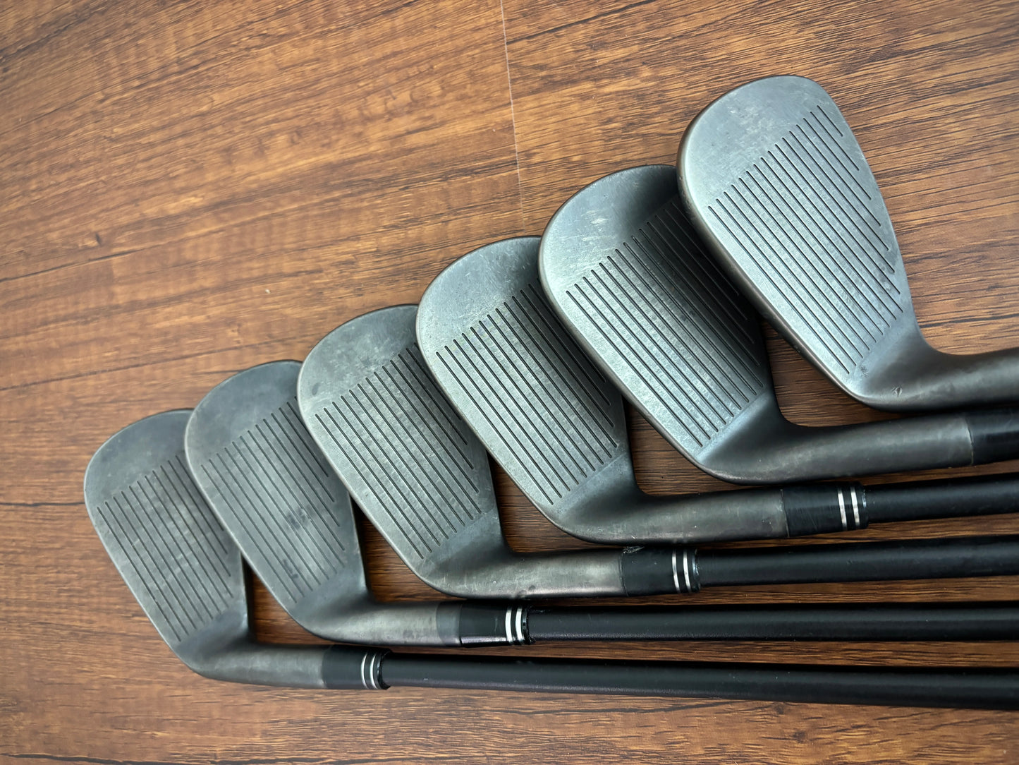 (+1”) Cobra King Forged TEC X Black Iron Set 5-PW / Regular Flex Graphite